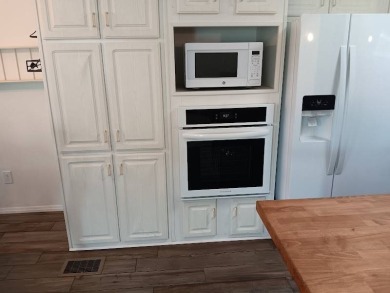 Furnished! Updated 2Bed/2Bath well-maintained Home with a on Four Lakes Golf Club in Florida - for sale on GolfHomes.com, golf home, golf lot