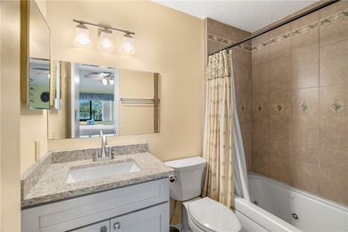 Charming 2BR/2BA condo w/ beautiful lake & golf views, soaring on Pelican Pointe 9 Hole Course in Florida - for sale on GolfHomes.com, golf home, golf lot