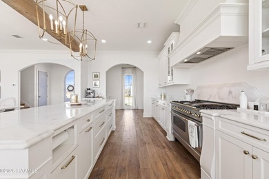 Located in the prestigious gated community of Le Triomphe Golf & on LeTriomphe Golf and Country Club in Louisiana - for sale on GolfHomes.com, golf home, golf lot