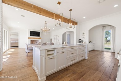 Located in the prestigious gated community of Le Triomphe Golf & on LeTriomphe Golf and Country Club in Louisiana - for sale on GolfHomes.com, golf home, golf lot