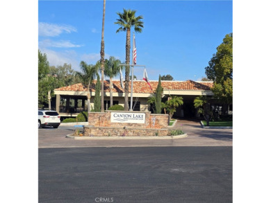 Location, location, location! This adorable turnkey gem is on Canyon Lake Country Club in California - for sale on GolfHomes.com, golf home, golf lot