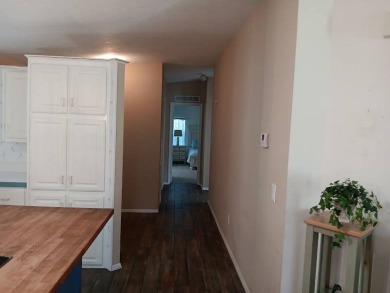 Furnished! Updated 2Bed/2Bath well-maintained Home with a on Four Lakes Golf Club in Florida - for sale on GolfHomes.com, golf home, golf lot