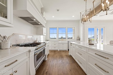 Located in the prestigious gated community of Le Triomphe Golf & on LeTriomphe Golf and Country Club in Louisiana - for sale on GolfHomes.com, golf home, golf lot