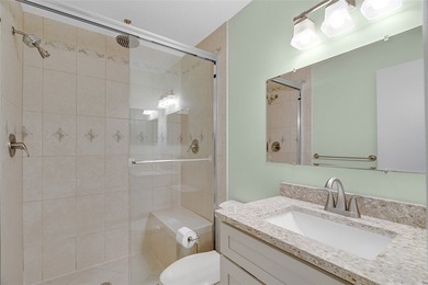 Charming 2BR/2BA condo w/ beautiful lake & golf views, soaring on Pelican Pointe 9 Hole Course in Florida - for sale on GolfHomes.com, golf home, golf lot