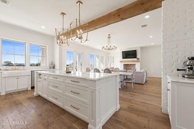 Located in the prestigious gated community of Le Triomphe Golf & on LeTriomphe Golf and Country Club in Louisiana - for sale on GolfHomes.com, golf home, golf lot