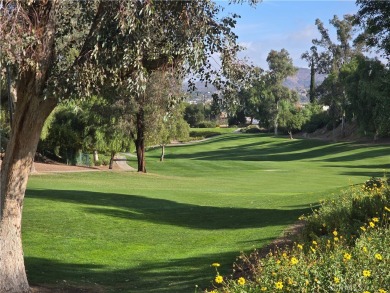 Location, location, location! This adorable turnkey gem is on Canyon Lake Country Club in California - for sale on GolfHomes.com, golf home, golf lot