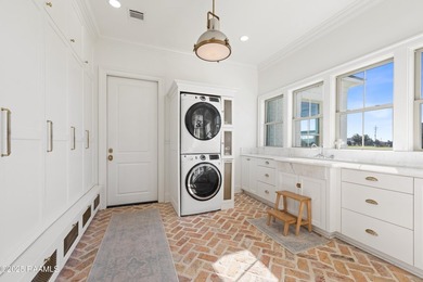 Located in the prestigious gated community of Le Triomphe Golf & on LeTriomphe Golf and Country Club in Louisiana - for sale on GolfHomes.com, golf home, golf lot