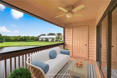 Charming 2BR/2BA condo w/ beautiful lake & golf views, soaring on Pelican Pointe 9 Hole Course in Florida - for sale on GolfHomes.com, golf home, golf lot