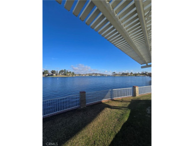 Location, location, location! This adorable turnkey gem is on Canyon Lake Country Club in California - for sale on GolfHomes.com, golf home, golf lot