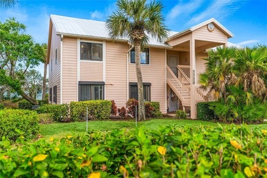 Charming 2BR/2BA condo w/ beautiful lake & golf views, soaring on Pelican Pointe 9 Hole Course in Florida - for sale on GolfHomes.com, golf home, golf lot