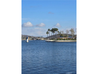 Location, location, location! This adorable turnkey gem is on Canyon Lake Country Club in California - for sale on GolfHomes.com, golf home, golf lot