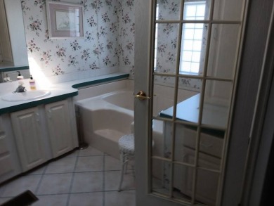 Furnished! Updated 2Bed/2Bath well-maintained Home with a on Four Lakes Golf Club in Florida - for sale on GolfHomes.com, golf home, golf lot