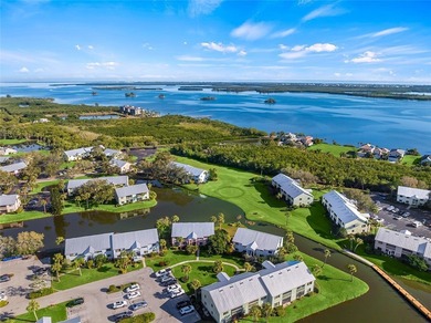 Charming 2BR/2BA condo w/ beautiful lake & golf views, soaring on Pelican Pointe 9 Hole Course in Florida - for sale on GolfHomes.com, golf home, golf lot