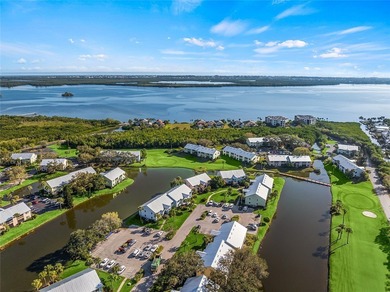 Charming 2BR/2BA condo w/ beautiful lake & golf views, soaring on Pelican Pointe 9 Hole Course in Florida - for sale on GolfHomes.com, golf home, golf lot