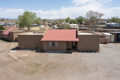 Wow!  Wow!  Wow!  Have we got the home for you!  It is not just on Black Mesa Golf Club in New Mexico - for sale on GolfHomes.com, golf home, golf lot