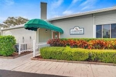 Charming 2BR/2BA condo w/ beautiful lake & golf views, soaring on Pelican Pointe 9 Hole Course in Florida - for sale on GolfHomes.com, golf home, golf lot