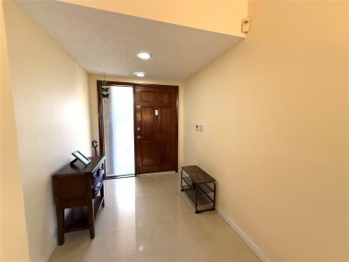 Rarely available, 3 bed/2 bath corner villa on a beautiful on Jacaranda Golf Club in Florida - for sale on GolfHomes.com, golf home, golf lot