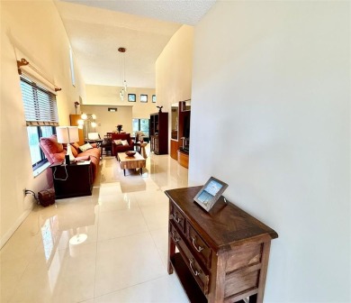 Rarely available, 3 bed/2 bath corner villa on a beautiful on Jacaranda Golf Club in Florida - for sale on GolfHomes.com, golf home, golf lot