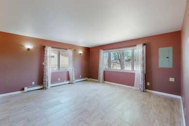 Wow! Wow! Wow! Have we got the home for you! It is not just a on Black Mesa Golf Club in New Mexico - for sale on GolfHomes.com, golf home, golf lot