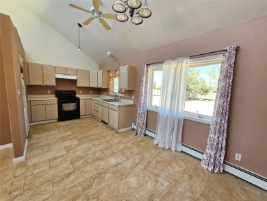 Wow! Wow! Wow! Have we got the home for you! It is not just a on Black Mesa Golf Club in New Mexico - for sale on GolfHomes.com, golf home, golf lot