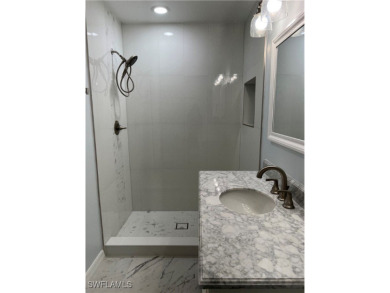 Back on the market with a newly remodeled primary bathroom! Do on Heritage Palms Golf and Country Club in Florida - for sale on GolfHomes.com, golf home, golf lot