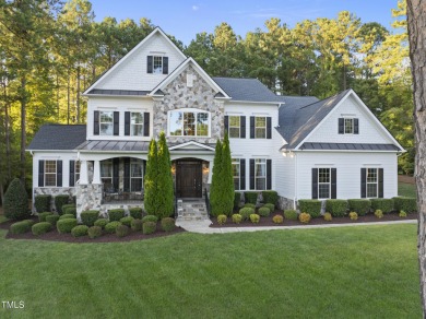 Welcome to an extraordinary home tucked away on a quiet on Hasentree Club in North Carolina - for sale on GolfHomes.com, golf home, golf lot