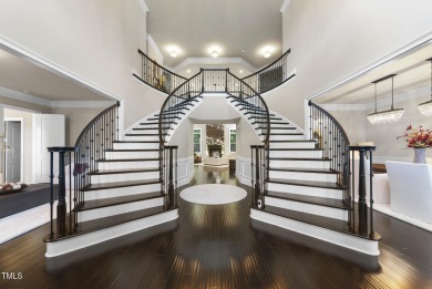 Welcome to an extraordinary home tucked away on a quiet on Hasentree Club in North Carolina - for sale on GolfHomes.com, golf home, golf lot