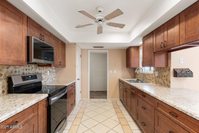 Seller is MOTIVATED! This move-in-ready gem has been recently on Sun City Lakes West and East in Arizona - for sale on GolfHomes.com, golf home, golf lot