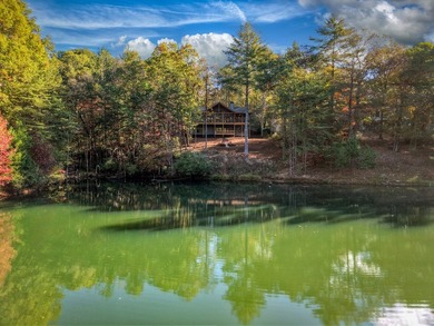 Overlooking a serene hidden lake--known by some residents as on White Path Golf Club in Georgia - for sale on GolfHomes.com, golf home, golf lot