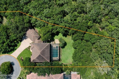 One or more photo(s) has been virtually staged. Nestled on a on The Ocean Course At Hammock Beach Resort in Florida - for sale on GolfHomes.com, golf home, golf lot