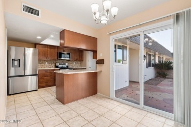 Seller is MOTIVATED! This move-in-ready gem has been recently on Sun City Lakes West and East in Arizona - for sale on GolfHomes.com, golf home, golf lot