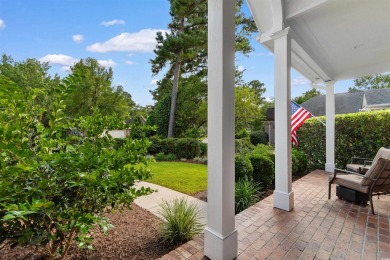 This gorgeous brick residence in sought-after Pawleys Island, SC on Pawleys Plantation Golf and Country Club in South Carolina - for sale on GolfHomes.com, golf home, golf lot