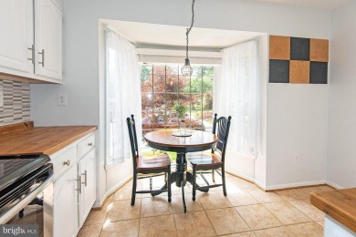 This spacious 3-level townhome is nestled in the sought-after on Bay Hills Golf Club in Maryland - for sale on GolfHomes.com, golf home, golf lot