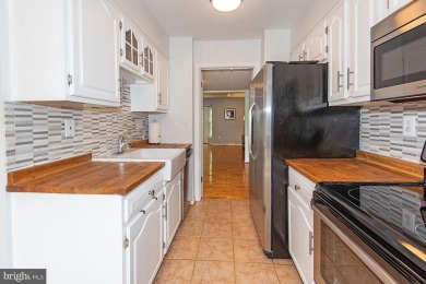 This spacious 3-level townhome is nestled in the sought-after on Bay Hills Golf Club in Maryland - for sale on GolfHomes.com, golf home, golf lot