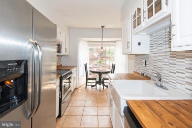 This spacious 3-level townhome is nestled in the sought-after on Bay Hills Golf Club in Maryland - for sale on GolfHomes.com, golf home, golf lot