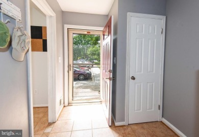This spacious 3-level townhome is nestled in the sought-after on Bay Hills Golf Club in Maryland - for sale on GolfHomes.com, golf home, golf lot