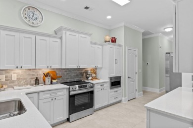 This gorgeous brick residence in sought-after Pawleys Island, SC on Pawleys Plantation Golf and Country Club in South Carolina - for sale on GolfHomes.com, golf home, golf lot