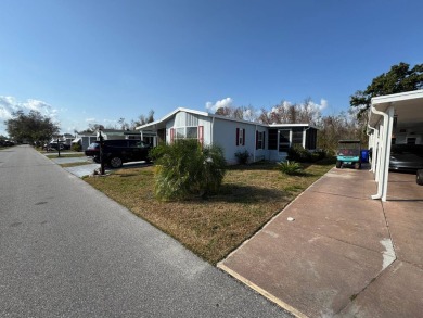 ***JUST REDUCED***This 2/2 1045 sq ft home is beautifully on Lake Henry Golf Club in Florida - for sale on GolfHomes.com, golf home, golf lot