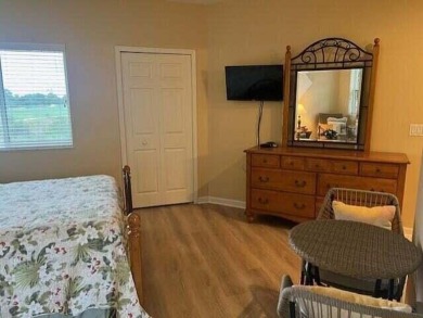 PGA VILLAGE CONDO WITH A SWEEPING VIEW OF THE PGA PETE DYE on The Legacy Golf and Tennis Club in Florida - for sale on GolfHomes.com, golf home, golf lot