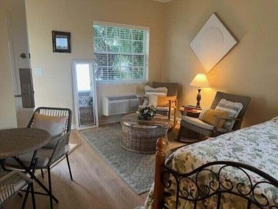 PGA VILLAGE CONDO WITH A SWEEPING VIEW OF THE PGA PETE DYE on The Legacy Golf and Tennis Club in Florida - for sale on GolfHomes.com, golf home, golf lot