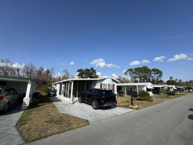 ***JUST REDUCED***This 2/2 1045 sq ft home is beautifully on Lake Henry Golf Club in Florida - for sale on GolfHomes.com, golf home, golf lot