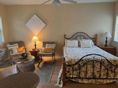 PGA VILLAGE CONDO WITH A SWEEPING VIEW OF THE PGA PETE DYE on The Legacy Golf and Tennis Club in Florida - for sale on GolfHomes.com, golf home, golf lot