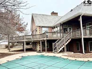 This exquisite custom-built estate sits on 9 acres and also has on The Links at Pretty Prairie in Kansas - for sale on GolfHomes.com, golf home, golf lot