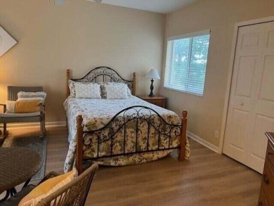 PGA VILLAGE CONDO WITH A SWEEPING VIEW OF THE PGA PETE DYE on The Legacy Golf and Tennis Club in Florida - for sale on GolfHomes.com, golf home, golf lot
