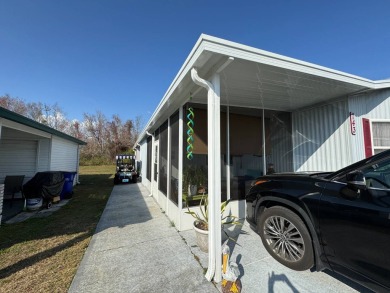 ***JUST REDUCED***This 2/2 1045 sq ft home is beautifully on Lake Henry Golf Club in Florida - for sale on GolfHomes.com, golf home, golf lot