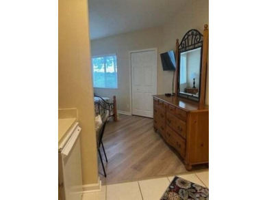 PGA VILLAGE CONDO WITH A SWEEPING VIEW OF THE PGA PETE DYE on The Legacy Golf and Tennis Club in Florida - for sale on GolfHomes.com, golf home, golf lot