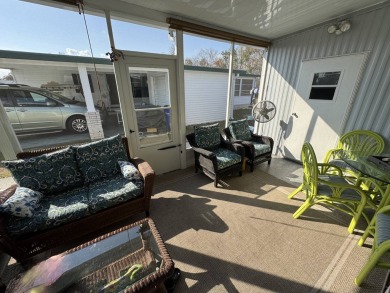 ***JUST REDUCED***This 2/2 1045 sq ft home is beautifully on Lake Henry Golf Club in Florida - for sale on GolfHomes.com, golf home, golf lot