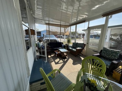 ***JUST REDUCED***This 2/2 1045 sq ft home is beautifully on Lake Henry Golf Club in Florida - for sale on GolfHomes.com, golf home, golf lot