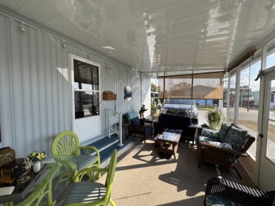 ***JUST REDUCED***This 2/2 1045 sq ft home is beautifully on Lake Henry Golf Club in Florida - for sale on GolfHomes.com, golf home, golf lot