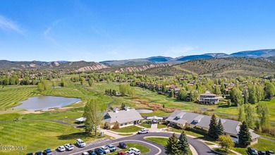 A one of a kind, nearly new residence located in the highly on Eagle Ranch in Colorado - for sale on GolfHomes.com, golf home, golf lot